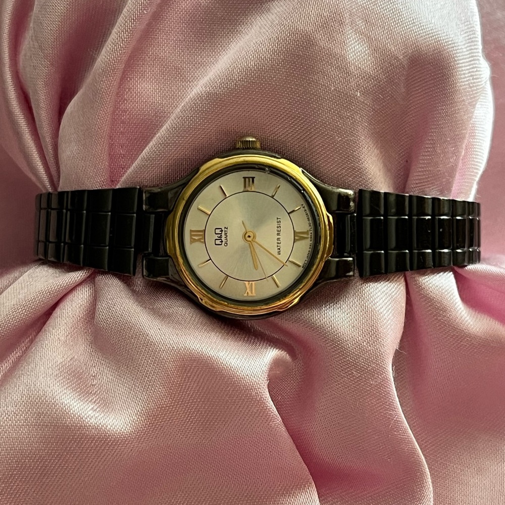 Women's Black and Gold Watch
